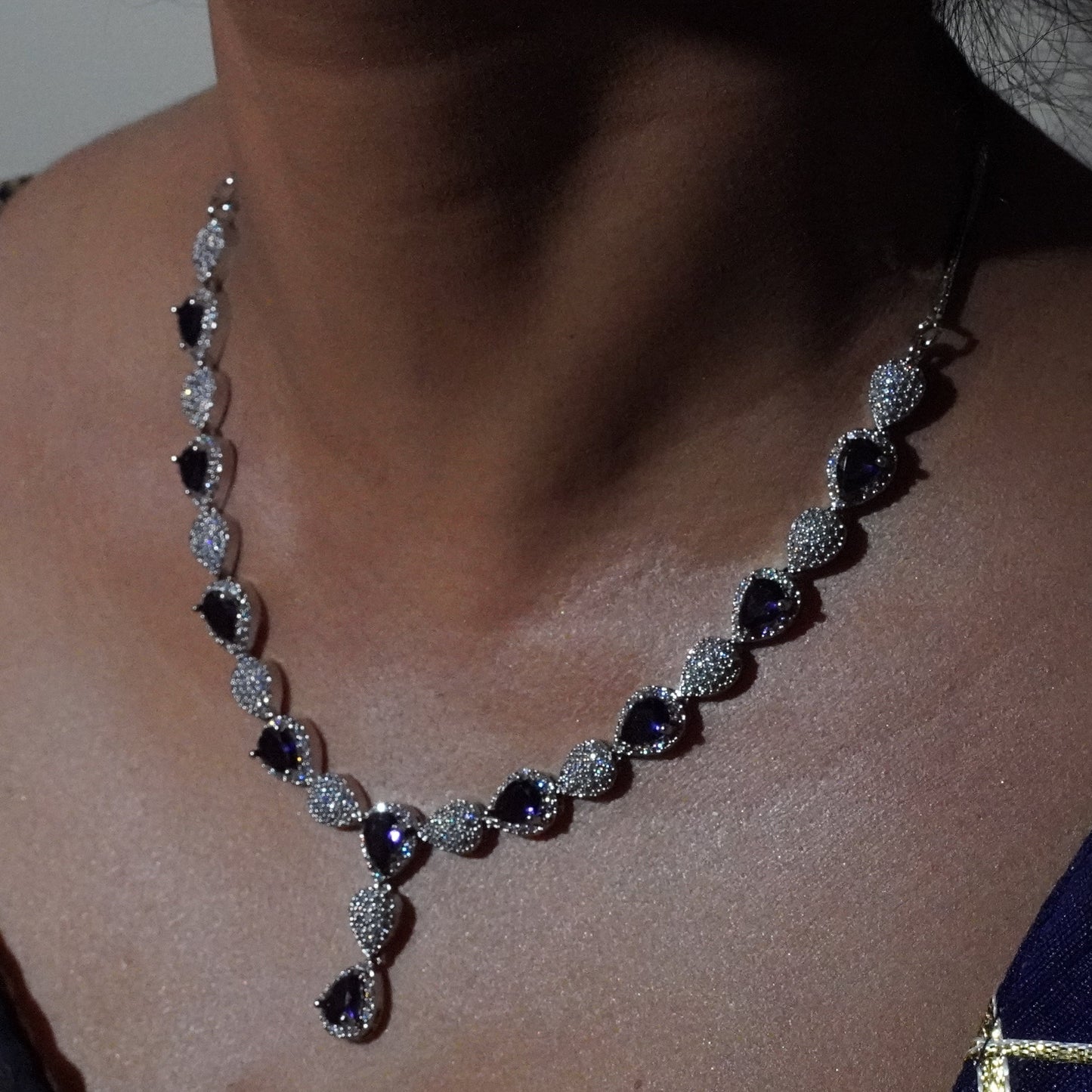 Purple Drop shape Diamond setting necklace with earings.
