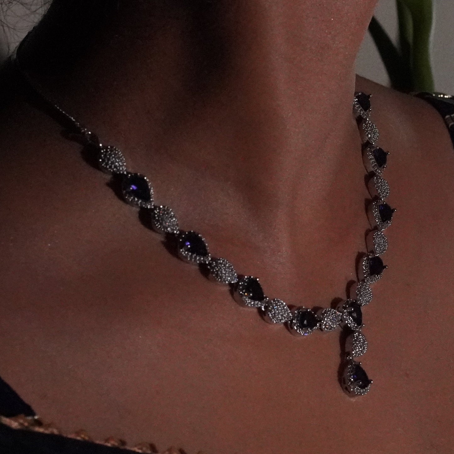 Purple Drop shape Diamond setting necklace with earings.