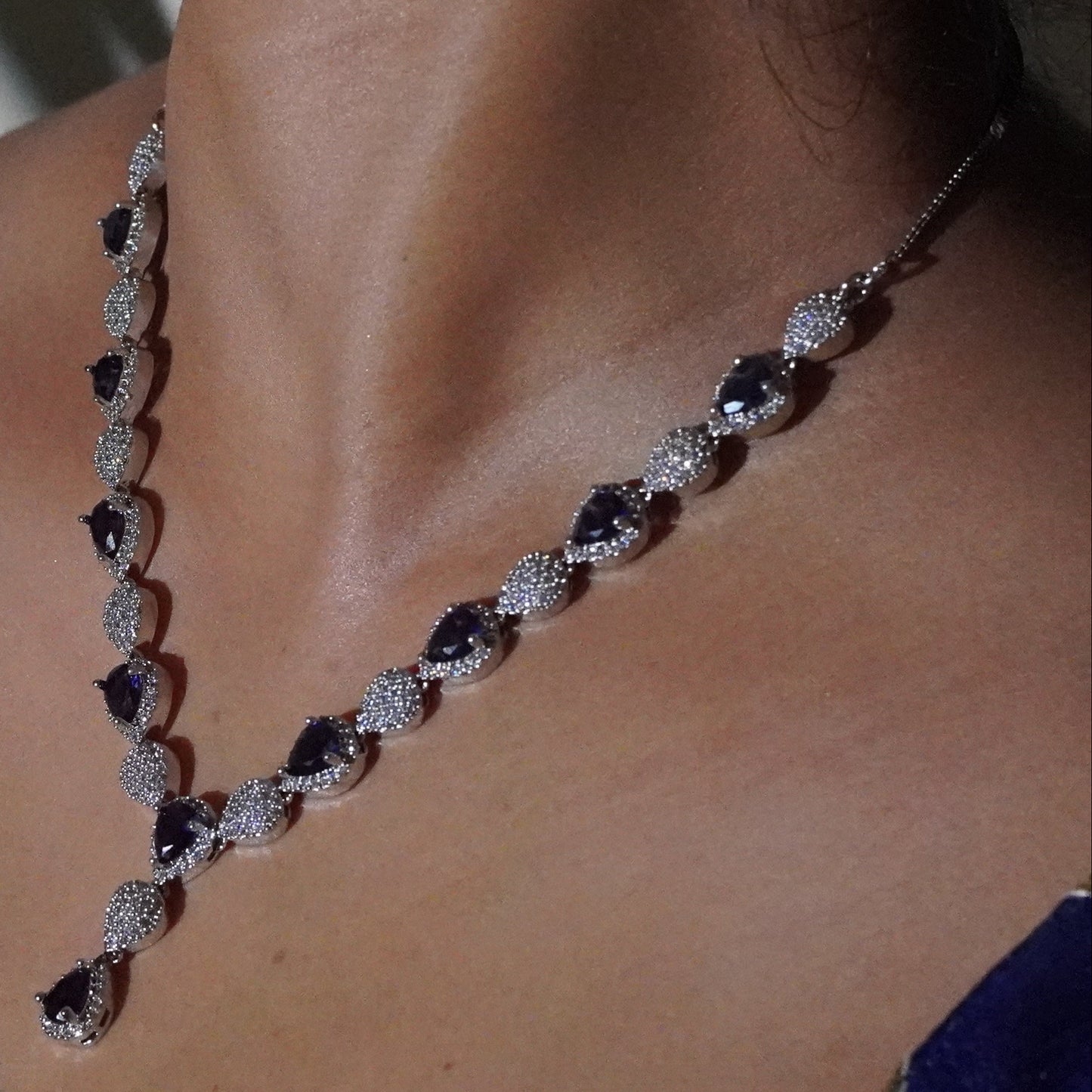 Purple Drop shape Diamond setting necklace with earings.
